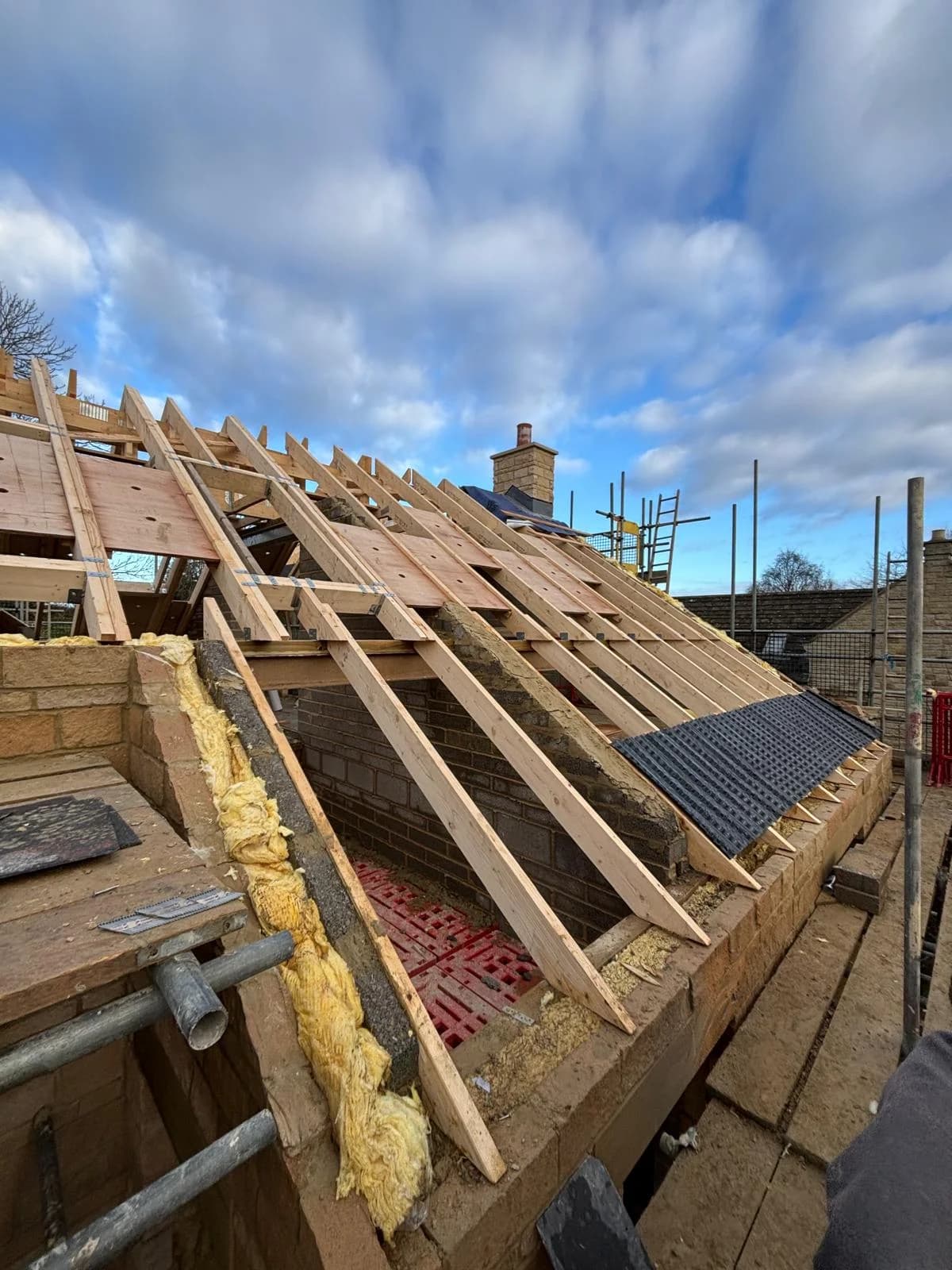 Lead-clad pitched roof in a Newcastle heritage setting — local landmark capability evidence